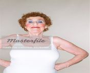 700 00781984em portrait of woman in tank top stock photo.jpg from bbw fat mature granny