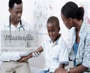 6110 06702732em doctor giving african child an injection in a doctors.jpg from doctors gives her injection in ass for lady patients video clipjaya parda fu