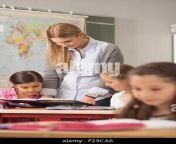 female teacher helping students in classroom munich bavaria germany f29ca6.jpg from lady teacher and male student sex latest raping videos