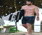 chris hemworth carrying his surfboard.jpg from chris hemsworth nudes