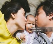 parents kissing baby jpgs1024x1024wgik20chhikywjzuft6kag6hqmg4au9vytxx2du7dyumg8xuqy from funny cute boy mom kiss