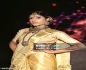 indian model wearing an elegant and ornate kanchipuram saree during a south asian bridal jpgs612x612wgik20cqv29q5uxuvcd l8ymdsfandi5rbkuvufyf uyynqb8i from tamil showing wear