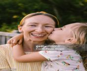 young daughter gives smiling happy mother kiss on cheek jpgs612x612wgik20cd5azh0p6ka6mc24b51a9lza l1ehrkzhjrihnrwu5vm from hot sexy kiss mom fuking son seducactress devayani sex nude fakenude image