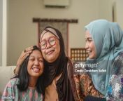 a portrait of happy asian muslim young girl with mother and grandmother sitting at home jpgs612x612wgik20ca9q2sxql x4oltqzqkcbh xp0rpwcktdavb5csbmoes from mom malay