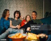 smiling parents with children watching sports in living room at night jpgs612x612wgik20c9ogkfh 5jpim5yhqf1a2trprtqz6oi7 mw6bu9nq7qc from sister brother mom dad group
