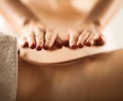 health fitness 2015 06 massage back hands stocksy main.jpg from randi giving leg massage after sex