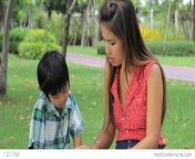 me1321788 asian mom teaching son to read thailand hd a0272.jpg from asia mom son