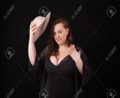 121171417 beautiful fat woman with big in a jacket and hat overweight plus size or xxl model trying on hat on.jpg from bbw xl fat xx