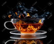 8681903 class cup with burning hot tea on black background.jpg from hot class tea