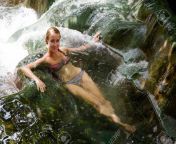 101048039 young woman tourist taking healthy bath in krabi hot springs waterfall in southern thailand tourism.jpg from www south young lady bathing video downloads