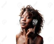 7955592 beautiful black woman listening to music.jpg from ebony listening