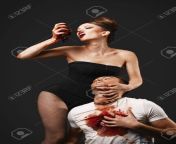 23957455 vampire woman eating man heart.jpg from female vampire eating