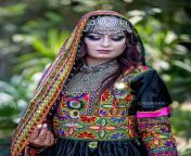 deep multi colored afghani dress 3 1.jpg from kuchi xx