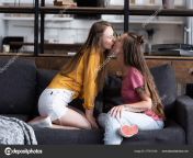 depositphotos 277813192 stock photo two lesbians kissing while sitting.jpg from sexy lezbians playing around lesbian