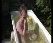 depositphotos 636894114 stock video child girl bathe summer bathtub.jpg from village bath video