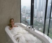 depositphotos 185982292 stock video beautiful woman enjoying relaxing bath.jpg from beautiful bath video