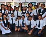 tara sharma poses with children at the launch of their painiting exhibition held in mumbai on october 9 2013.jpg from bujpori xxxchool taera images indena hind