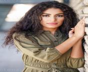 young arab woman with curly hair outdoors photo.jpg from yuong wwww xxxxxx