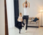 teaching how to dance father with his little daughter is at home together photo.jpg from father teaches daughter dance