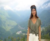 beautiful happy young woman in mountains in the background of fog video.jpg from 20054885 jpg