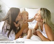 392447348.jpg from lesbian mother kissing