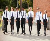 small group of teenage students in uniform outside schoo pufwvq8.jpg from school uniform