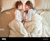 brother and sister are lying in bed in the bedroom and silly happily around 2a5r7hx.jpg from brother and sister sleeping brother secret sister