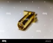 close up of gold plated sma male connector electronics component in partial focus on white background 2a7twf7.jpg from closeup sma