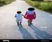 brother and sister are walking together outdoor 2ay1jtt.jpg from walking step brother sister fu
