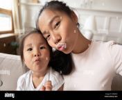 beautiful mother little daughter taking selfie webcam faces view 2be845p.jpg from asian mom webcam