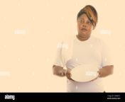 studio shot of fat black african woman thinking while holding empty white plate with towel over the shoulder 2d6bht1.jpg from bbw fat black fatty virgin pussy