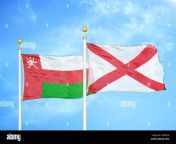 oman and northern ireland two flags on flagpoles and blue sky 2dxbt5k.jpg from oman ni