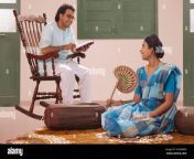 bengali couple sitting together in living room at home 2k3gwmg.jpg from bangla couple playin