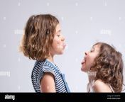 two naughty young girls sticking out their tongues 2k2mt0p.jpg from naugty young