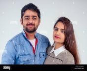 indian couple in love posing at studio white background 2j884x3.jpg from indian b f g f kiss