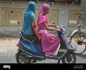 indian women cover themselves fully to protect themselves from the sun as they ride a two wheeler in allahabad india friday may 04 2007 after a brief respite from the sweltering heat mercurystarted climbing up in many parts of north india ap photorajesh kumar singh 2pbj5jn.jpg from north indian aunty riding hot