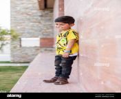 islamabad pakistan 15th march 2023 child full shot of young boy wearing black pent and yellow shirts 2pgtmy6.jpg from pak with small biy