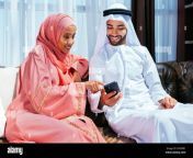 happy middle eastern couple wearing traditional arab clothing at home married arabian husband and wife bonding together in the apartment concepts a 2r5ppr1.jpg from wife dayouth arab