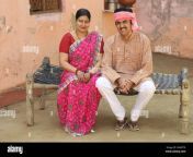 indian rural farmer couple sitting outdoors together indian villagers attire husband and wife sitting on cot rural indian man and woman 2rakyt8.jpg from desi village couples out door romance