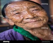 thimphu bhutan old woman worshiping at the national memorial chorten m5nep1.jpg from fatty aged village woman