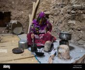 al hamra oman febrary 2nd 2018 omani woman making preparations in m26x7x.jpg from al omani make