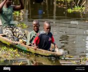 ganvie benin jan 11 2017 unidentified beninese little boys sails in a wooden boat over the lake nokwe benin people suffer of poverty due to the pc3a86.jpg from benin vano baby azetogbèdé de benin