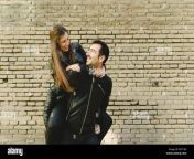 girl riding on the back of her boyfriend laughing and having fun together as they look young and happy rkt1k9.jpg from beautiful girlfriend riding her man