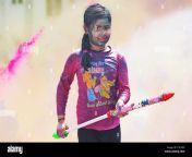 girl playing with pichkari holi festival t5ch09.jpg from tamil pichakari