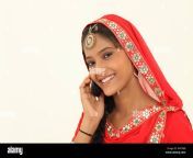indian woman talking on a mobile phone and smiling w4798b.jpg from indian call in red