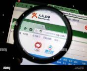 file a chinese netizen browses the websites of online review site dianpingcom and web portal qqcom in yichang city south chinas hubei province w8f20d.jpg from av4 us youku