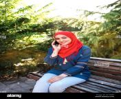 beautiful young arabic girl in hijab posing for a camera at summer street w17nre.jpg from www arab