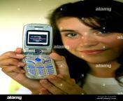 a teen girl downloads a music video onto a 3g capable mobile or cell a4aykw.jpg from mother son sex manipur video downloads waptrickদে teen girl force