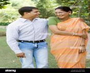 mother laughing with her adult son outdoors a4w2mx.jpg from desi old mom and son