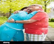 couple hugging outside ace8hw.jpg from fat hug